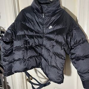 Nike sportswear club, black puffer jacket featuring a full zipper design size XL